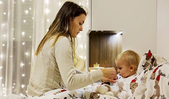 Mother with sick child.