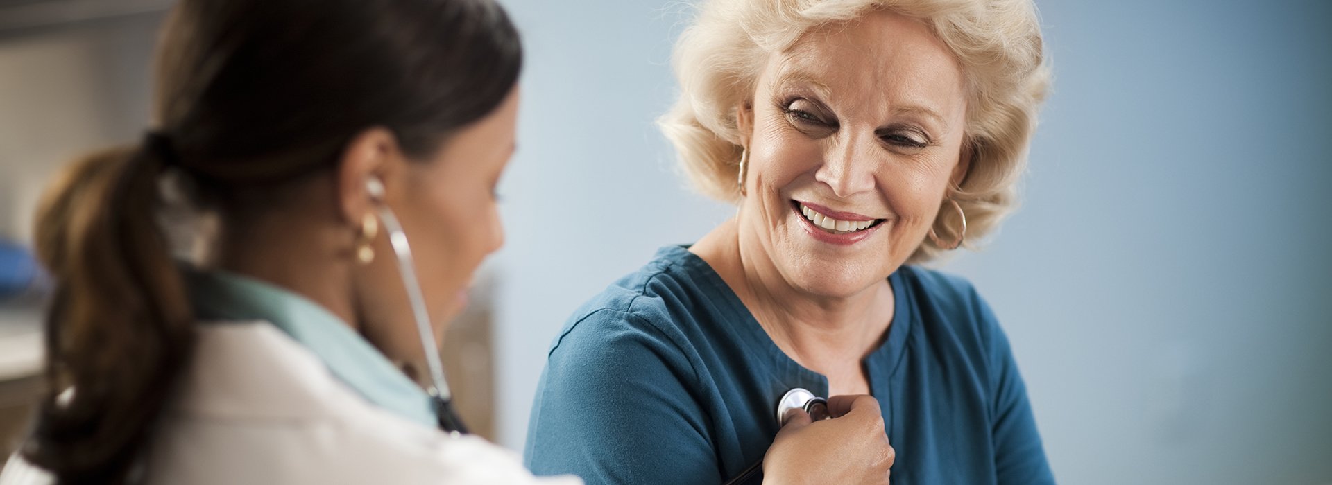 Older female patient getting medicare wellness visit.