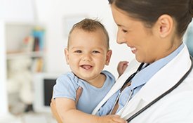 Doctor with baby infant