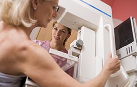 Woman having a mammogram.