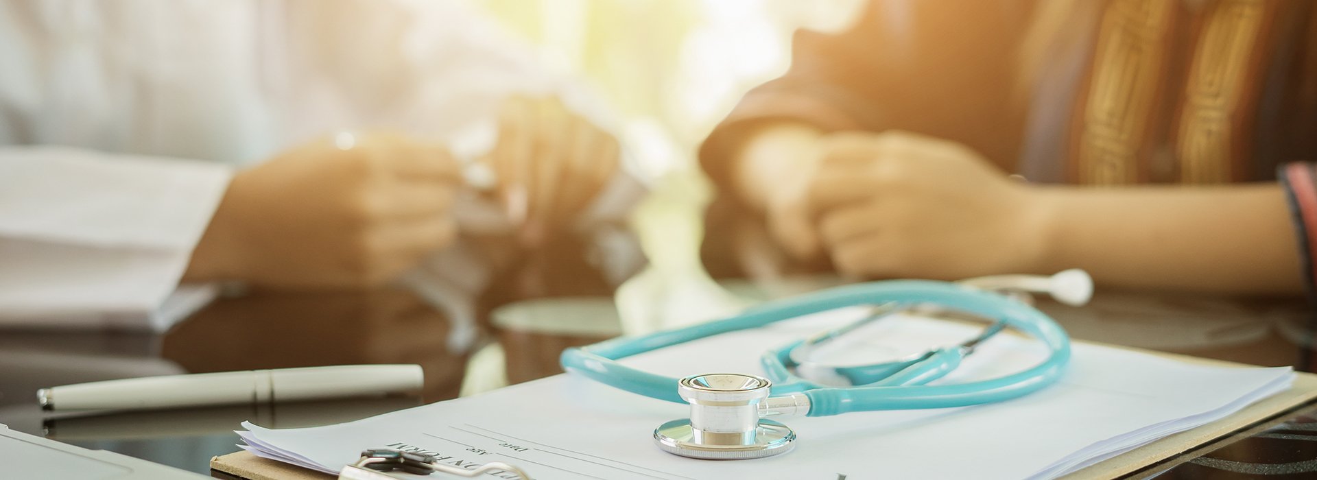 Doctor talking to patient.